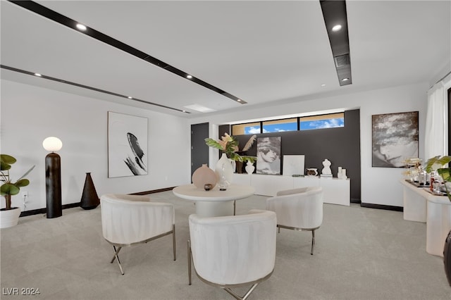 view of carpeted dining area