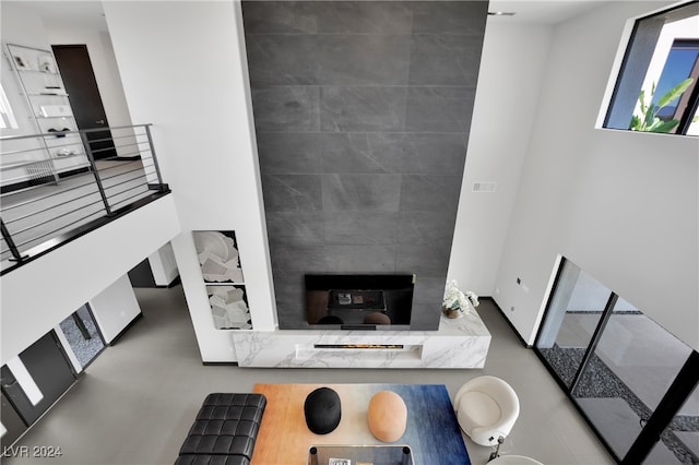 living room featuring concrete floors