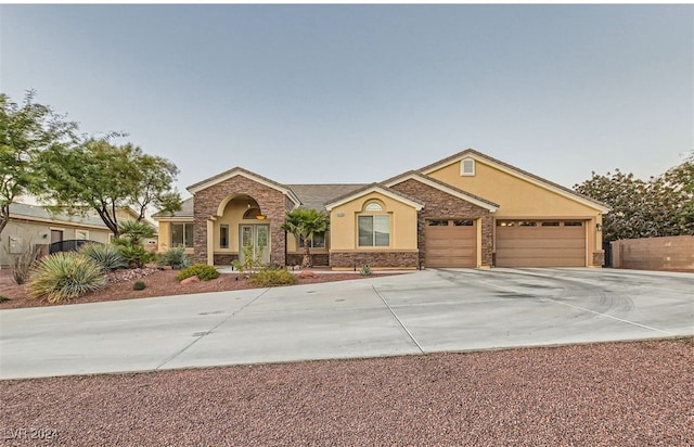 view of front of property featuring a garage