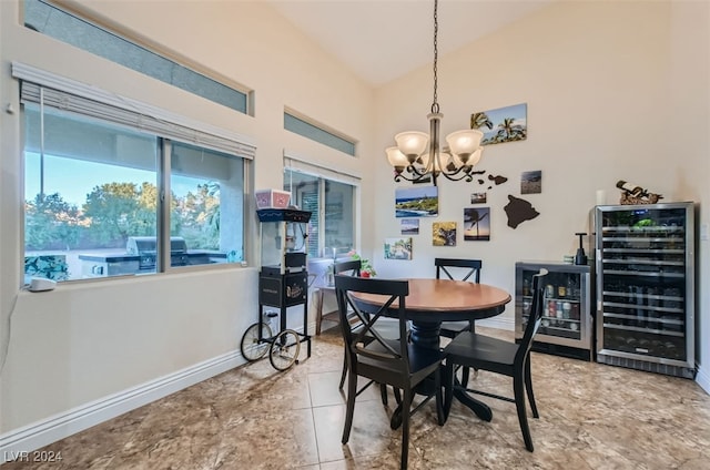 dining room with beverage cooler and an inviting chandelier