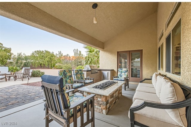 view of patio / terrace with an outdoor kitchen and grilling area