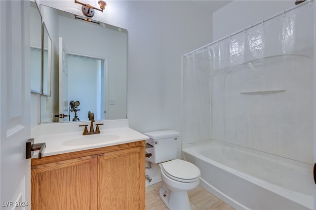 full bathroom with tile patterned floors, vanity, shower / tub combo, and toilet