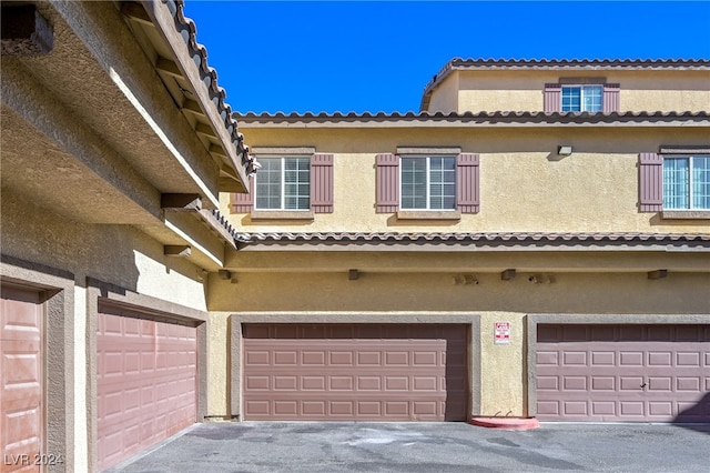 exterior space with a garage