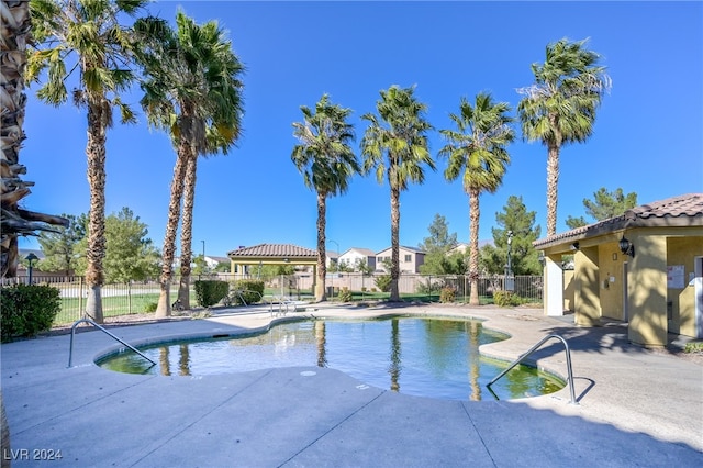 view of swimming pool featuring a patio area