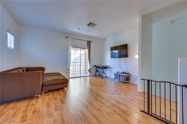 living room with light hardwood / wood-style floors