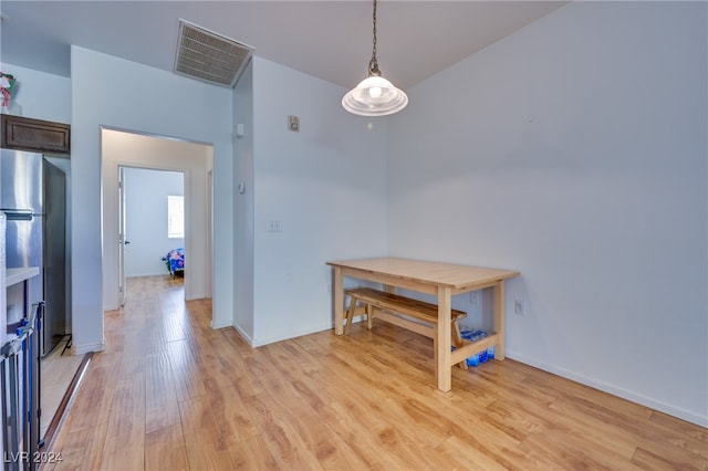 dining room featuring light hardwood / wood-style floors