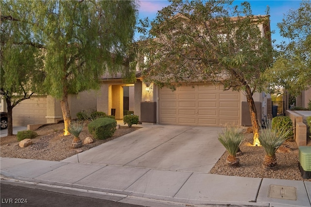 obstructed view of property featuring a garage