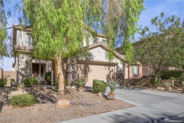 view of front of home with a garage