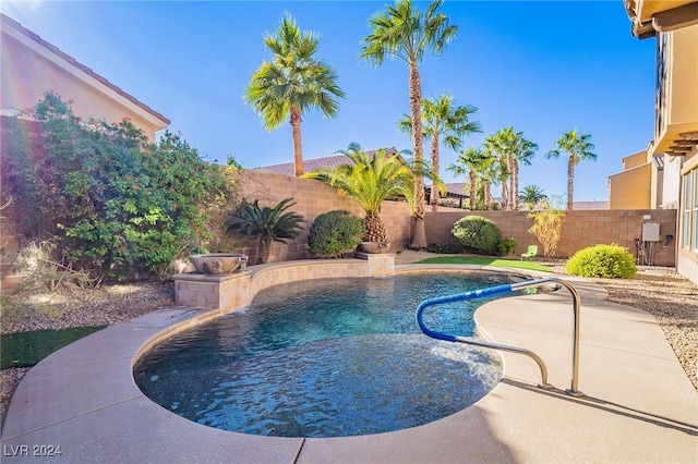 view of pool featuring a patio and pool water feature