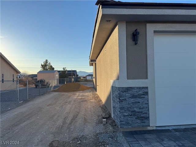 view of property exterior at dusk