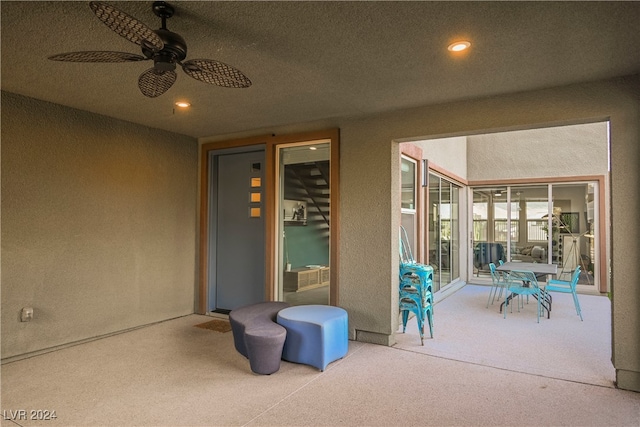 view of patio with ceiling fan