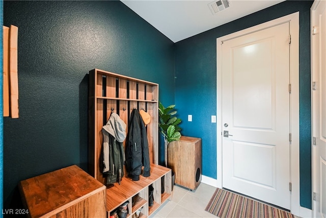 mudroom featuring light tile patterned floors