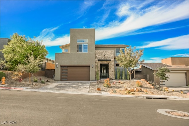 view of front of home with a garage