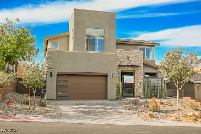 view of front of property featuring a garage