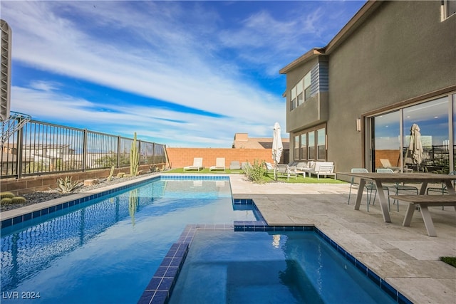 view of pool with a patio