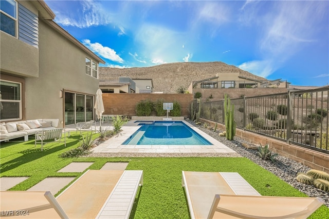 view of pool featuring a patio and an outdoor living space