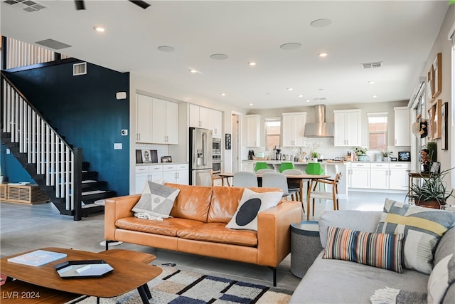 living room with light tile patterned floors