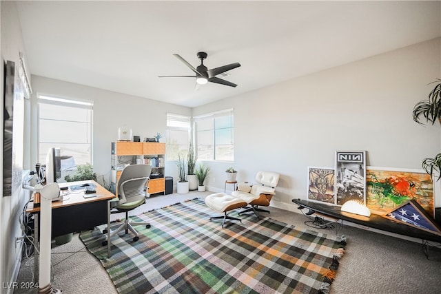 home office with carpet flooring and ceiling fan