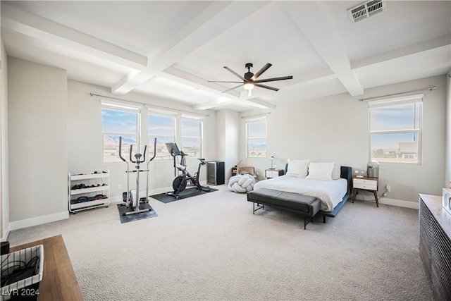 carpeted bedroom with ceiling fan, beam ceiling, and coffered ceiling