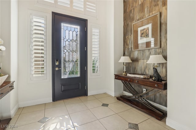 tiled entryway with plenty of natural light