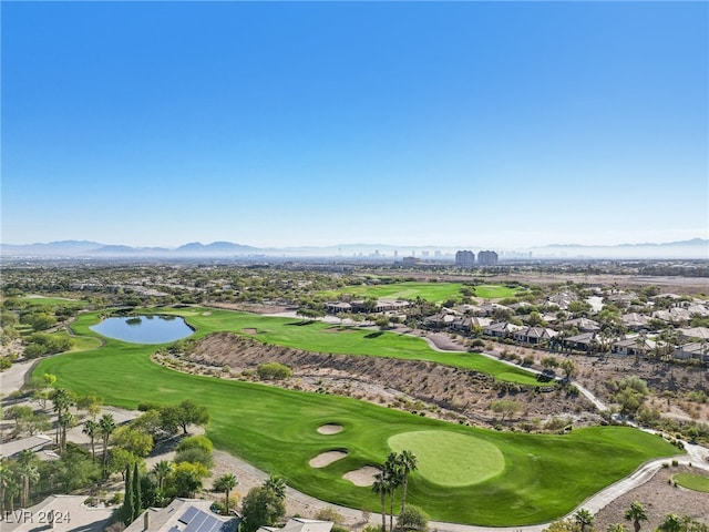 aerial view featuring a water and mountain view