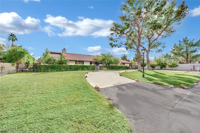 view of front of home with a front lawn