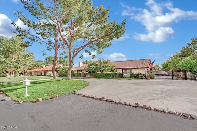 view of front of home with a front lawn