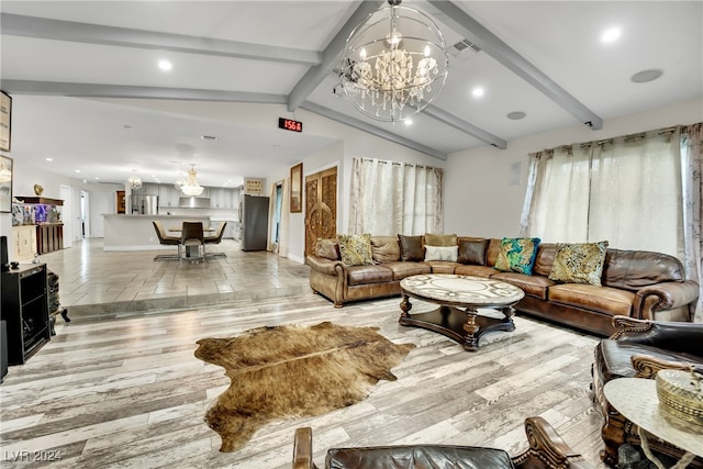 living room featuring an inviting chandelier, light wood-type flooring, and lofted ceiling with beams