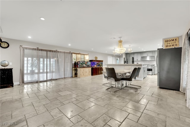 dining room featuring a notable chandelier