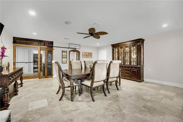 dining area with ceiling fan