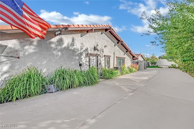 view of home's exterior with a patio area