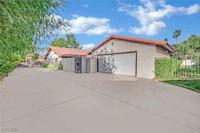 view of side of property with an outdoor structure