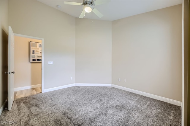 unfurnished room featuring carpet floors and ceiling fan