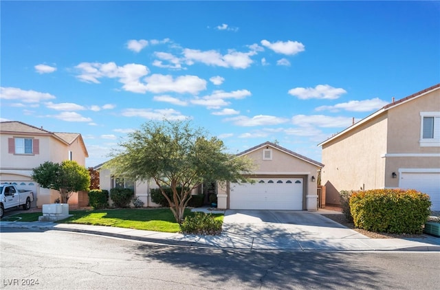 front of property with a garage