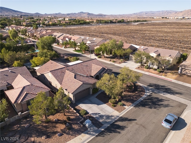 bird's eye view with a mountain view