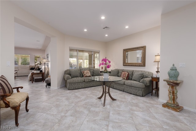 living room featuring plenty of natural light