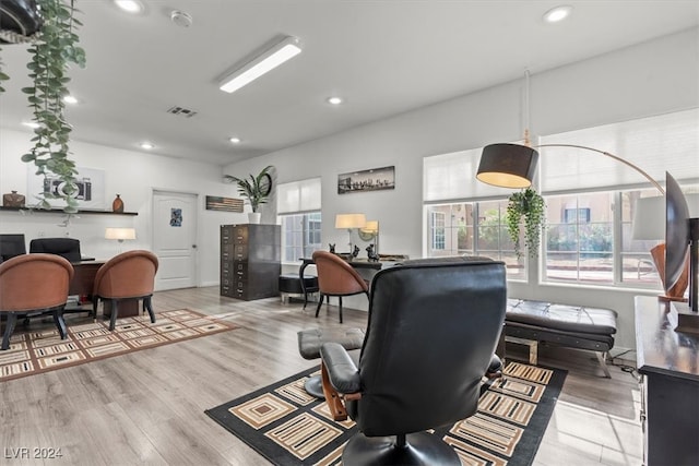 office with light hardwood / wood-style flooring