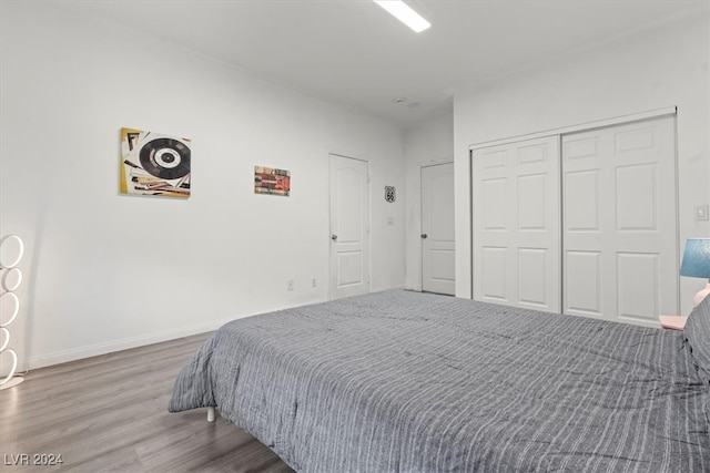 bedroom featuring hardwood / wood-style floors