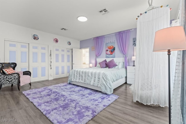 bedroom featuring hardwood / wood-style floors