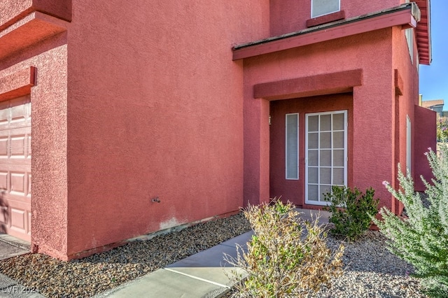 entrance to property with a garage