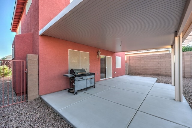 view of patio featuring a grill