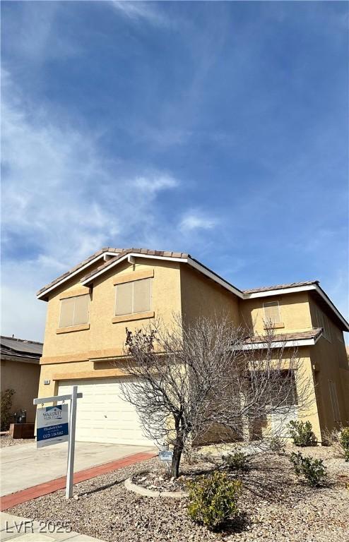 view of front of home featuring a garage