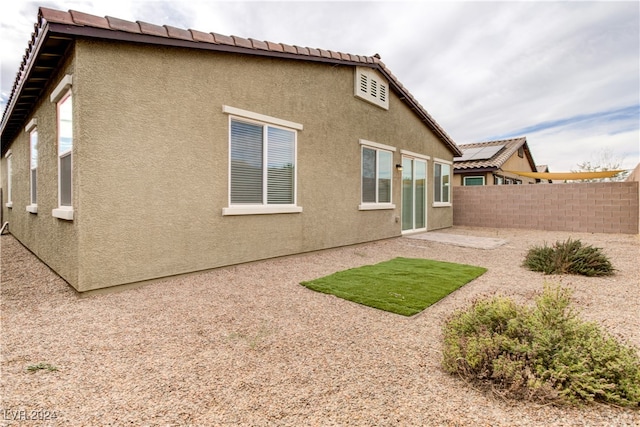 back of house featuring a patio