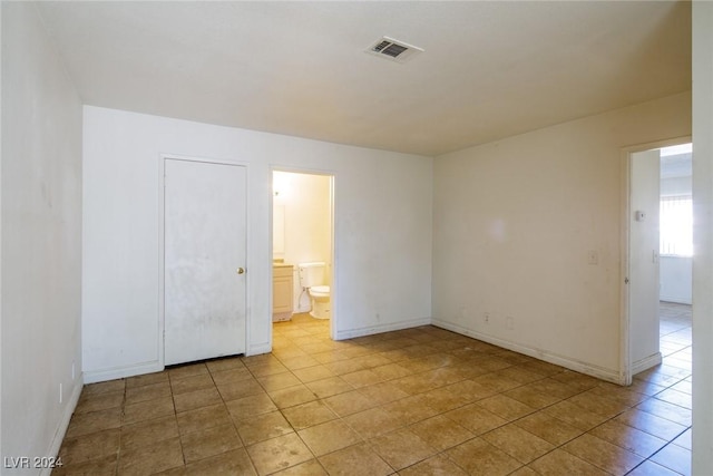 view of tiled empty room