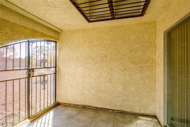 entrance to property featuring a balcony