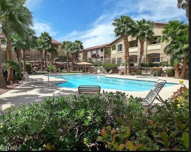 view of pool with a patio area