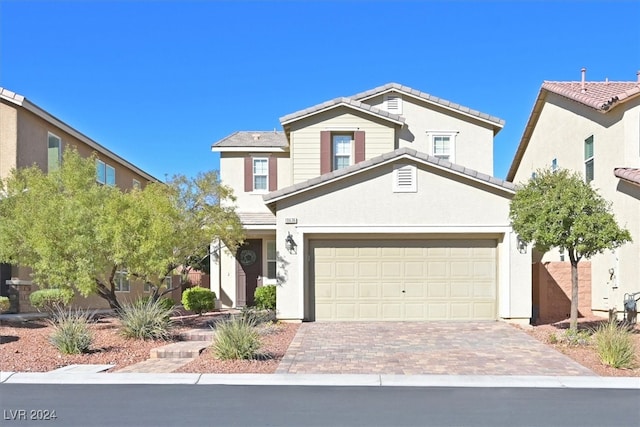 view of property featuring a garage