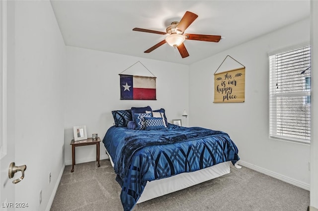 bedroom featuring ceiling fan and carpet floors