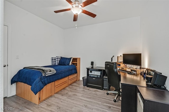 bedroom featuring ceiling fan and light wood-type flooring