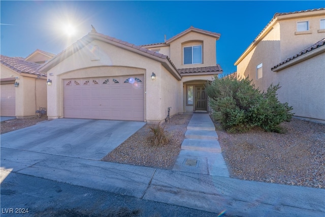 view of front of home with a garage